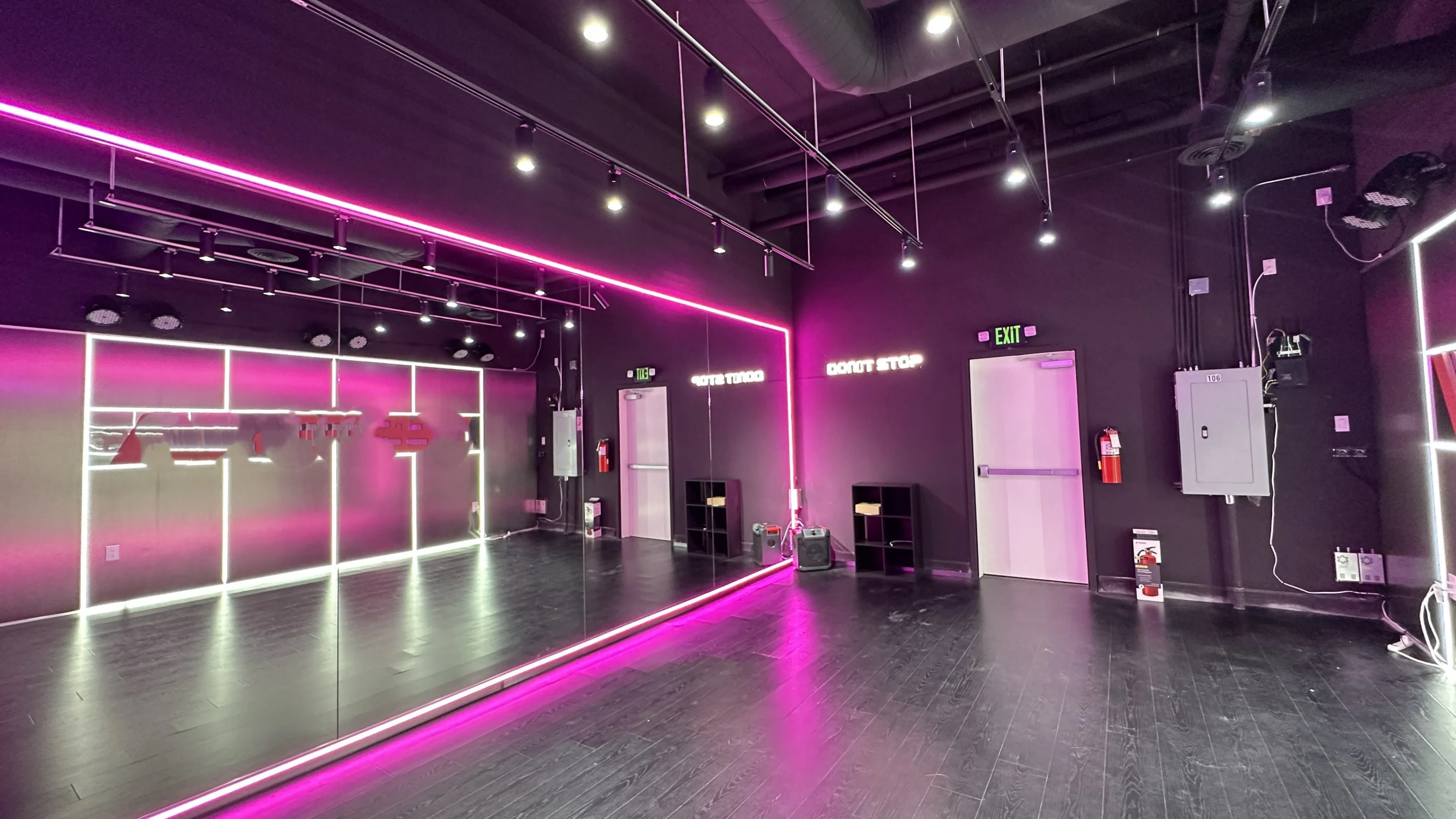 Sway dance instructor guiding students through choreography in the studio