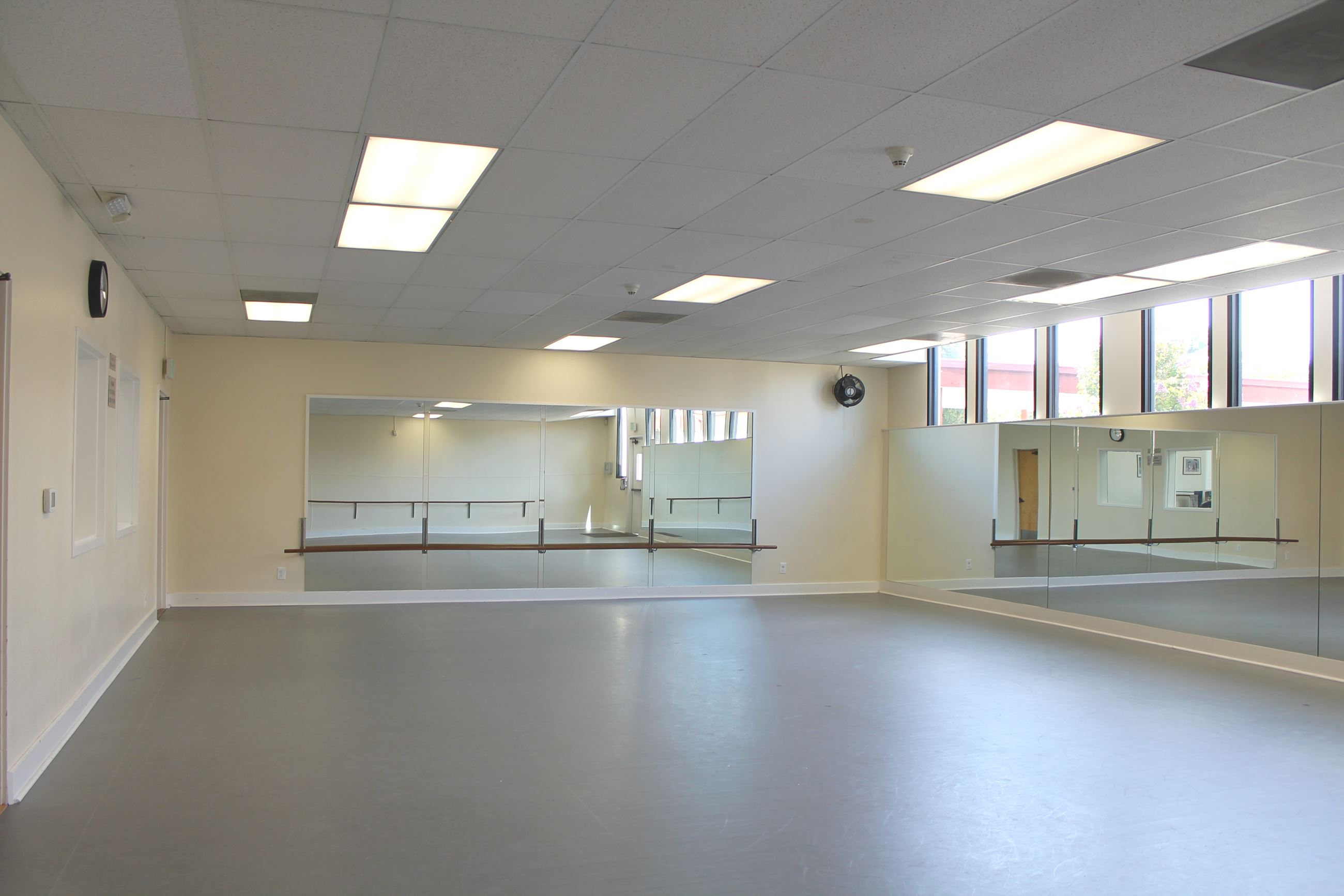 Sway dancers practicing choreography together in a bright dance studio